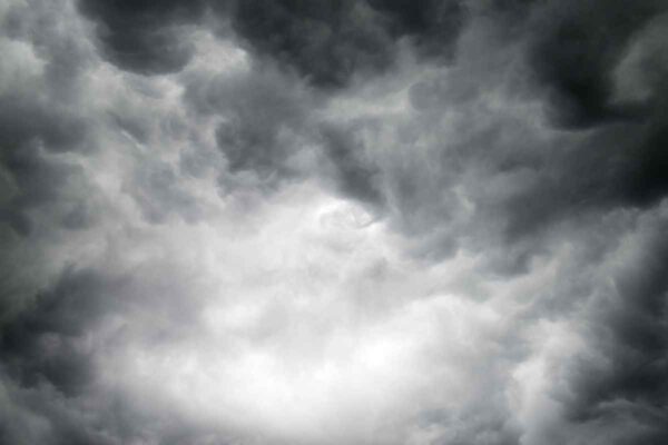 An oncoming storm brews, making one wish they had storm-proof glass on their home.